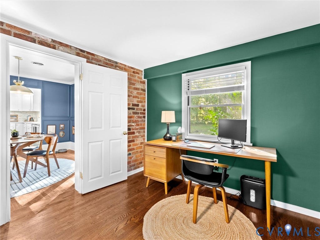 8341 Charlise Road, Stratford Hills, Midlothian, VA 23235 Exposed brick wall accents, wood-finish flooring, and a multi-pane window