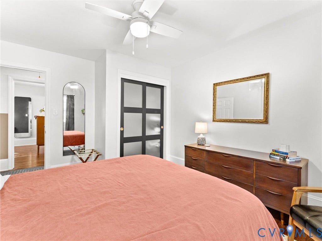 8341 Charlise Road, Stratford Hills, Midlothian, VA 23235 Room featuring a ceiling fan with integrated lighting and sliding closet doors with frosted glass panels