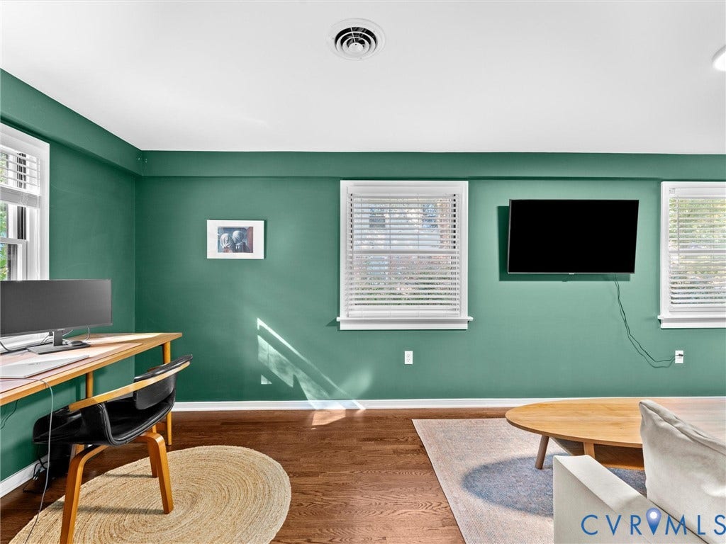 8341 Charlise Road, Stratford Hills, Midlothian, VA 23235 Wood-finish flooring and multiple windows with installed horizontal blinds
