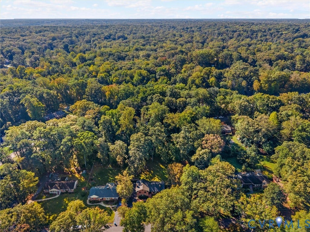 8341 Charlise Road, Stratford Hills, Midlothian, VA 23235 Aerial perspective of a wooded landscape featuring dense deciduous tree coverage
