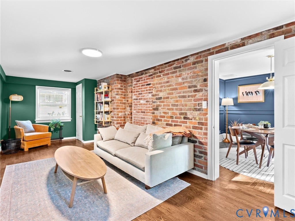 8341 Charlise Road, Stratford Hills, Midlothian, VA 23235 Exposed brick wall feature, wood-finish flooring, and recessed ceiling lighting