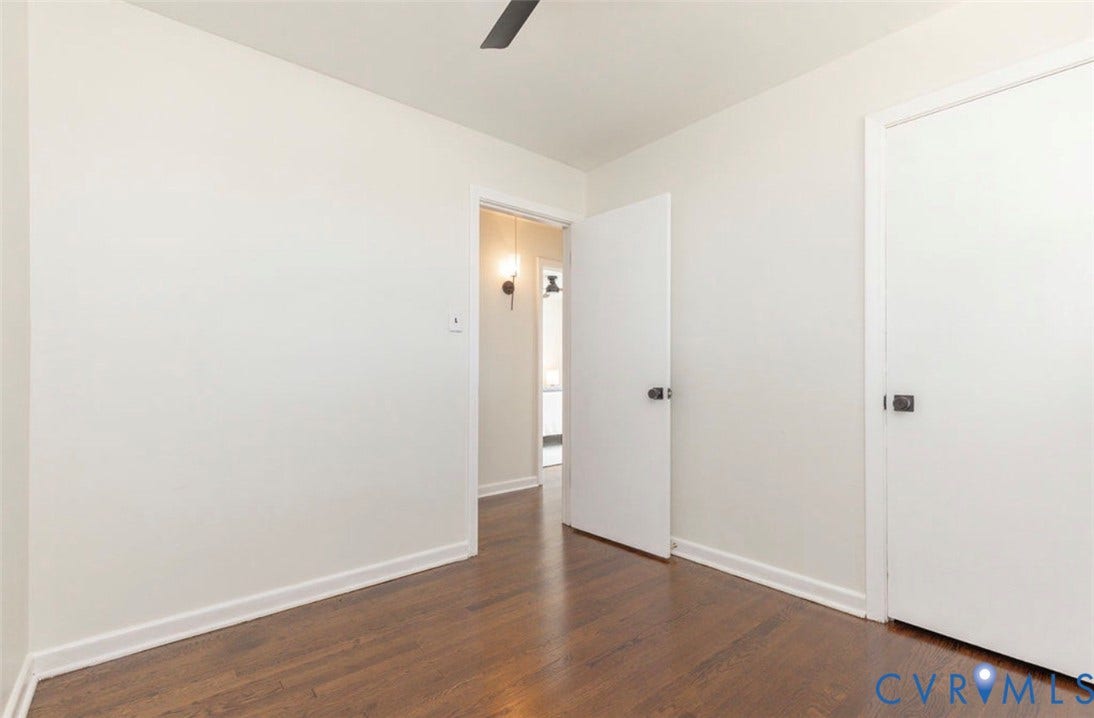 2211 Apollo Road, Fairfield, VA 23223 Hardwood flooring, white walls, white doors, black hardware, ceiling fan