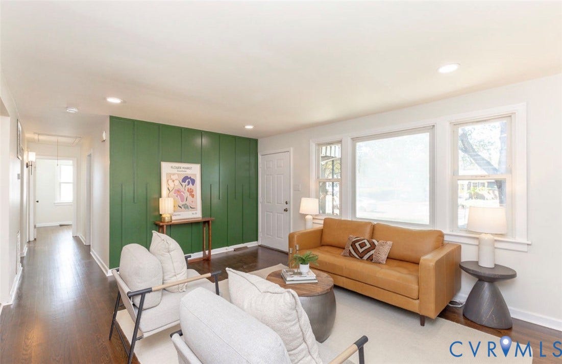 2211 Apollo Road, Fairfield, VA 23223 Wood-finish flooring, recessed lighting, and a feature wall with vertical paneling