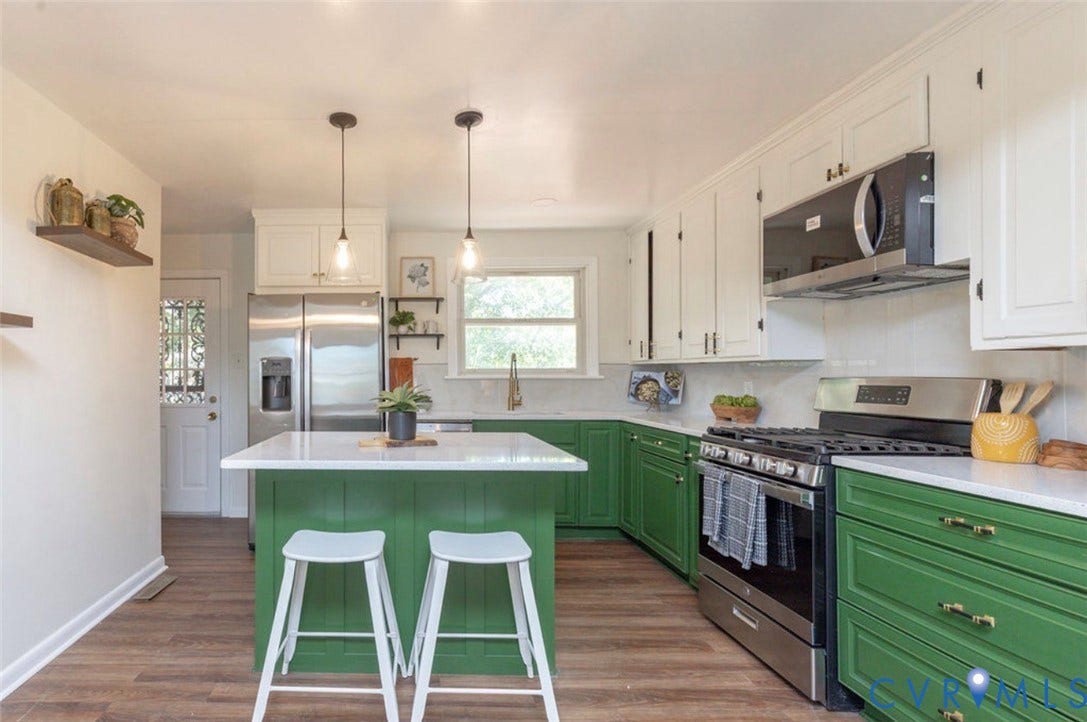 2211 Apollo Road, Fairfield, VA 23223 Kitchen featuring a central island with countertop, two pendant lights, wood-finish flooring, white upper cabinetry, and green lower cabinetry