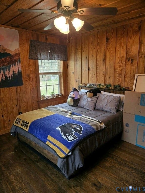 Wood-paneled walls and a matching wood-paneled ceiling