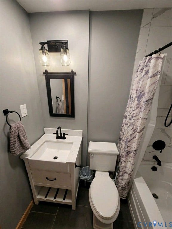 Modern vanity with integrated sink, matte black faucet, and open shelving