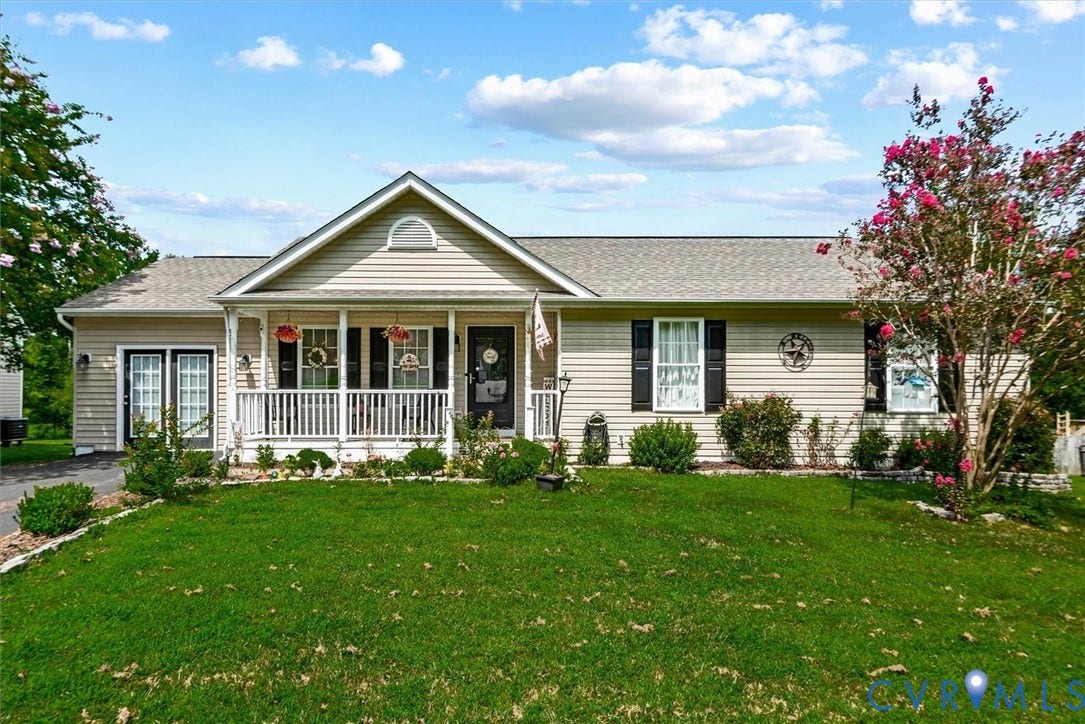 2421 Pittston Road, Ruffin's Pond, Fredericksburg, VA 22408 Siding exterior with a covered porch, white railings, and an asphalt shingle roof