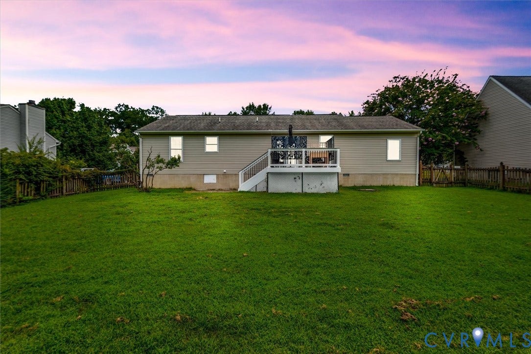 2421 Pittston Road, Ruffin's Pond, Fredericksburg, VA 22408 Expansive green lawn with a wood fence perimeter