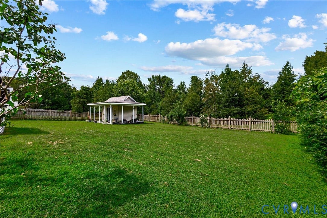 2421 Pittston Road, Ruffin's Pond, Fredericksburg, VA 22408 Expansive lawn with a picket fence perimeter and a detached covered structure