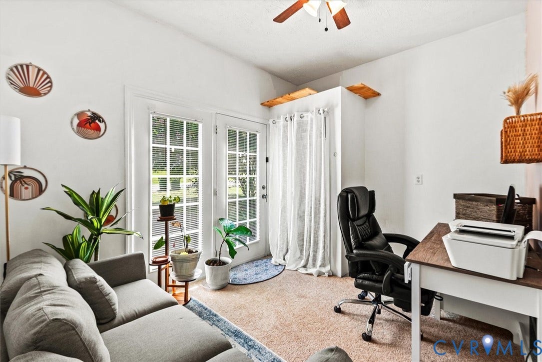 2421 Pittston Road, Ruffin's Pond, Fredericksburg, VA 22408 Dual glass-paned doors with white trim, wood-finish ceiling fan with lighting, and light-toned wall-to-wall carpeting