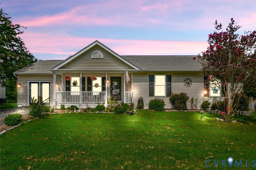 2421 Pittston Road, Ruffin's Pond, Fredericksburg, VA 22408 Siding exterior with a covered front porch, gable roof, and an attached carport
