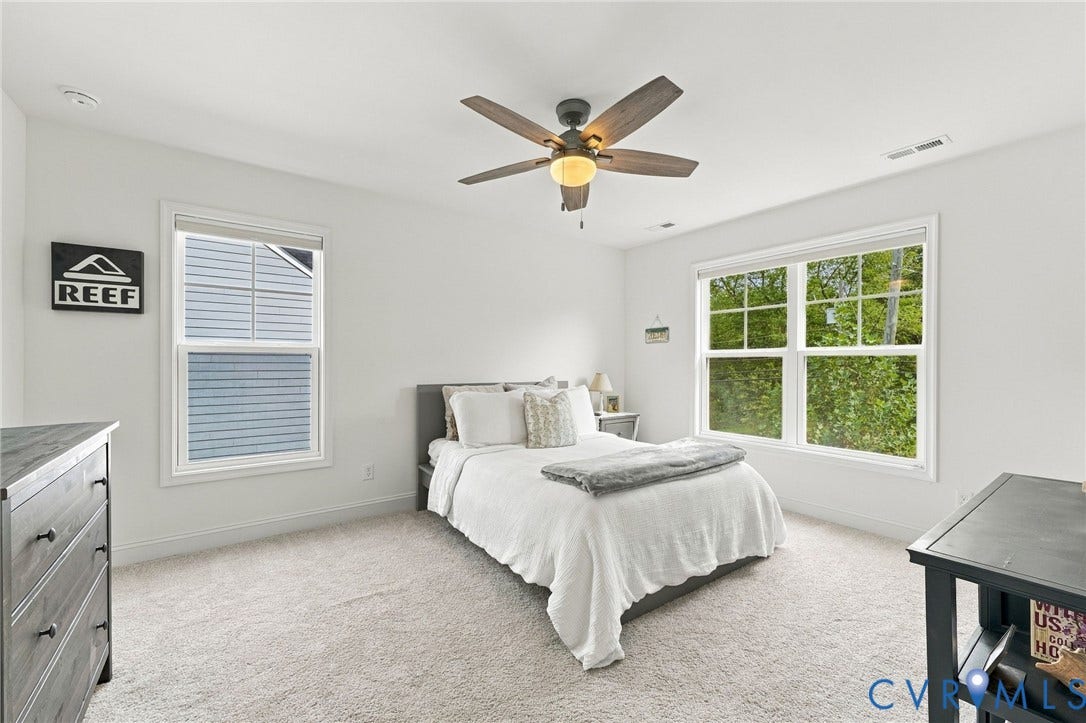 White walls with light gray carpeting