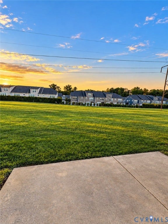 10507 Benoni Trail, Glen Allen, VA 23059 Expansive green lawn with a concrete patio