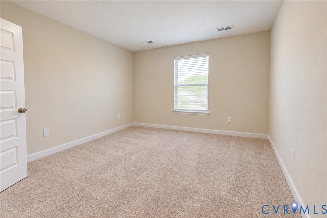 10507 Benoni Trail, Glen Allen, VA 23059 Neutral tone wall paint, carpet flooring, window with blinds, and white trim
