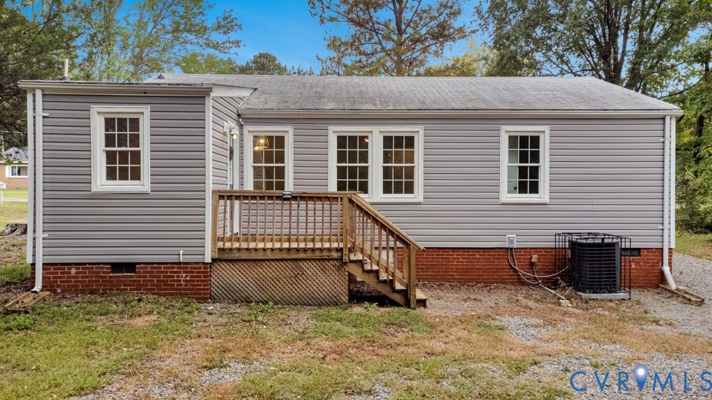 4130 Sprenkle Lane, Wistar Heights, Henrico, VA 23228 Gray siding exterior with brick foundation