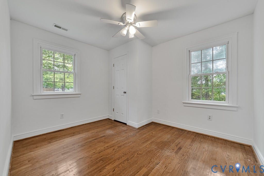 4130 Sprenkle Lane, Wistar Heights, Henrico, VA 23228 Wood-finish flooring with white baseboards