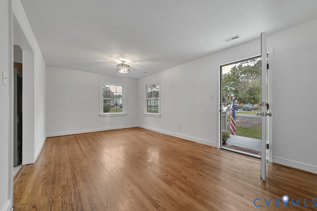 4130 Sprenkle Lane, Wistar Heights, Henrico, VA 23228 Hardwood flooring, recessed lighting, white walls, and bright windows