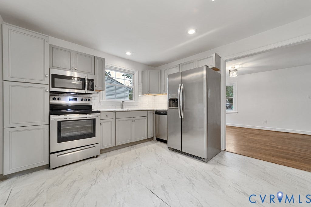 4130 Sprenkle Lane, Wistar Heights, Henrico, VA 23228 Kitchen featuring stainless steel appliances, light gray cabinetry, a white subway tile backsplash, recessed lighting, and light-toned flooring