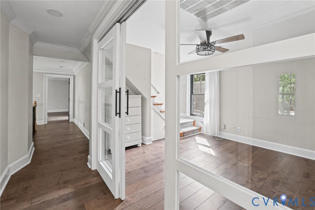 Office or additional area with doors that lead to third floor