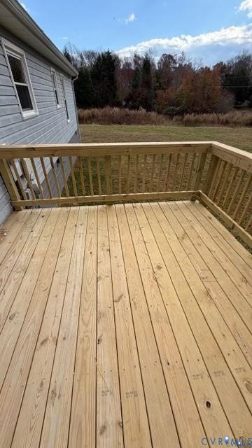 Wood deck with perimeter railing