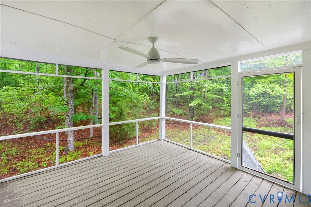 10731 Spring Run Road, Manchester, Chesterfield, VA 23832 Screened porch with wood-finish decking, white ceiling, and a ceiling fan