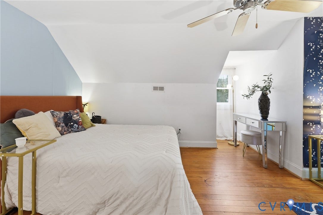 Angled ceilings with light blue and white walls