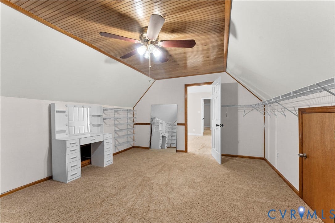 2307 Garrison Place Terrace, Garrison Place, Midlothian, VA 23112 Vaulted room featuring a wood-plank ceiling, wall-to-wall carpeting, and integrated white shelving