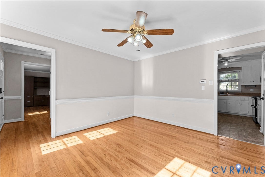 2307 Garrison Place Terrace, Garrison Place, Midlothian, VA 23112 Room featuring wood-finish flooring, chair rail molding, crown molding, and a ceiling fan with integrated lighting