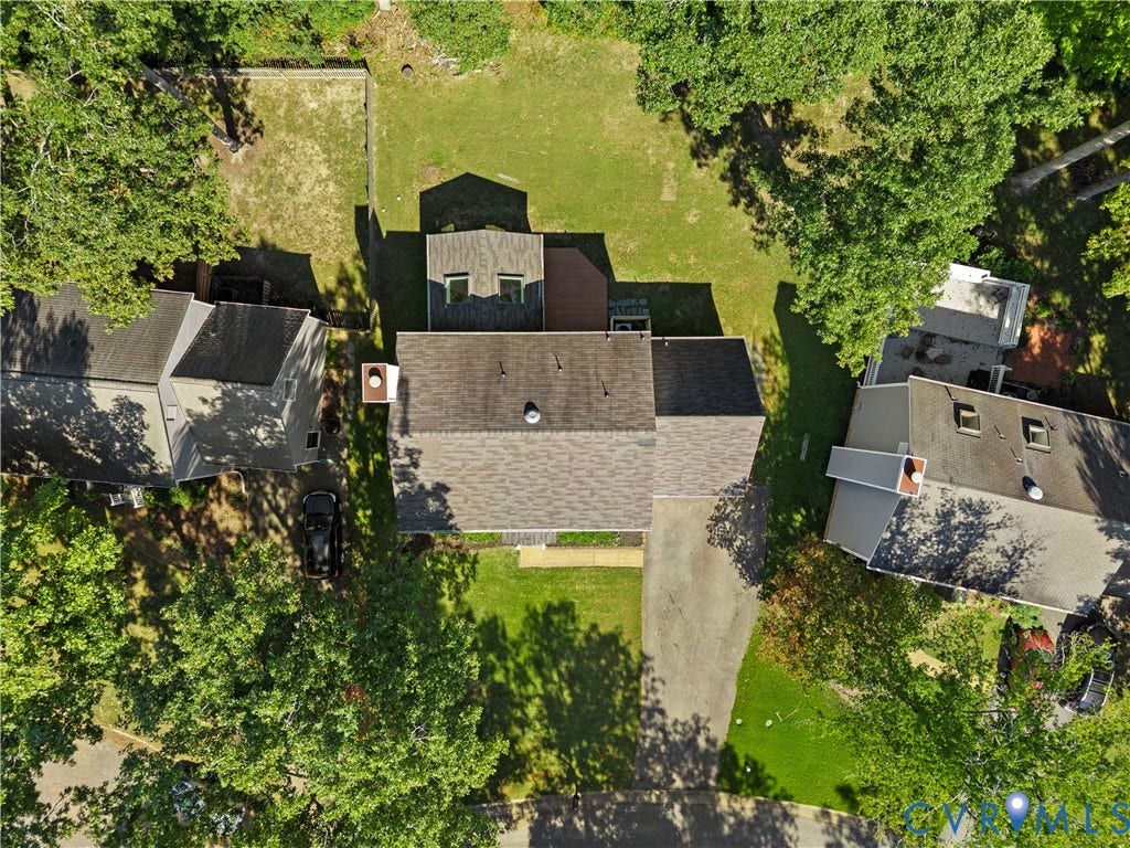 2307 Garrison Place Terrace, Garrison Place, Midlothian, VA 23112 Aerial perspective of property featuring an expansive lawn, mature tree canopy, multi-pitched shingle roofing, and paved driveway