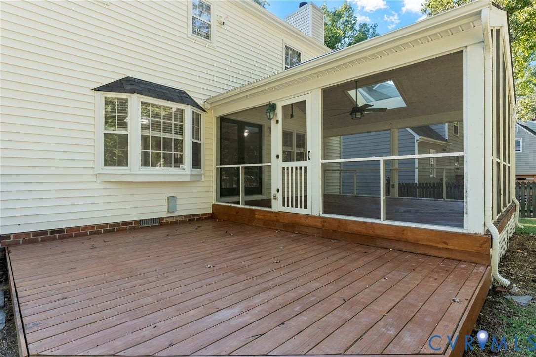 2307 Garrison Place Terrace, Garrison Place, Midlothian, VA 23112 Exterior wood deck featuring a screened-in porch with a skylight, ceiling fan, and bay window