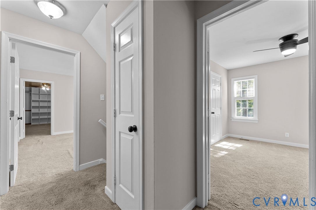 2307 Garrison Place Terrace, Garrison Place, Midlothian, VA 23112 Neutral-toned interior featuring multi-panel interior doors, wall-to-wall carpeting, ceiling-mounted light fixtures, and a window with white trim