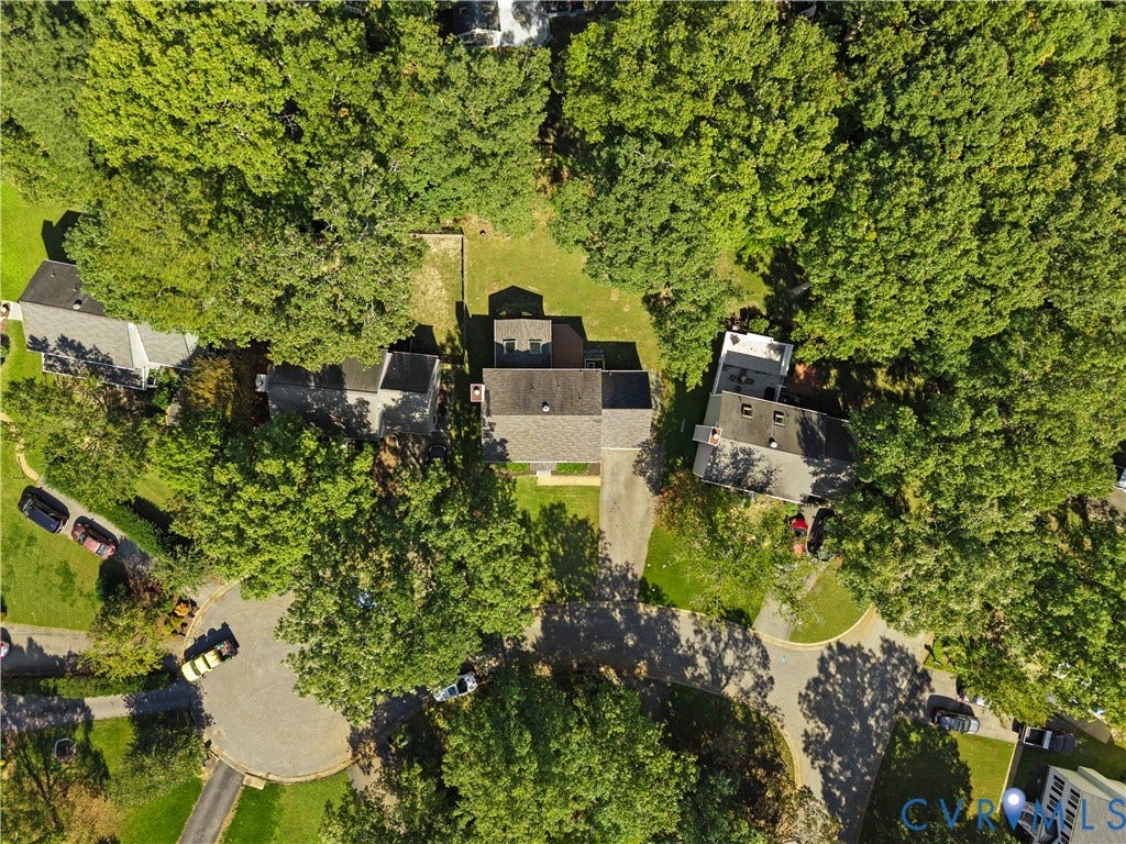 2307 Garrison Place Terrace, Garrison Place, Midlothian, VA 23112 Aerial perspective featuring a residential lot with a paved driveway, mature trees, and established landscaping