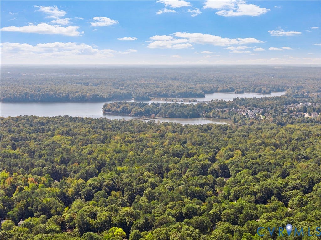 2307 Garrison Place Terrace, Garrison Place, Midlothian, VA 23112 Aerial perspective showcasing expansive woodlands and water frontage