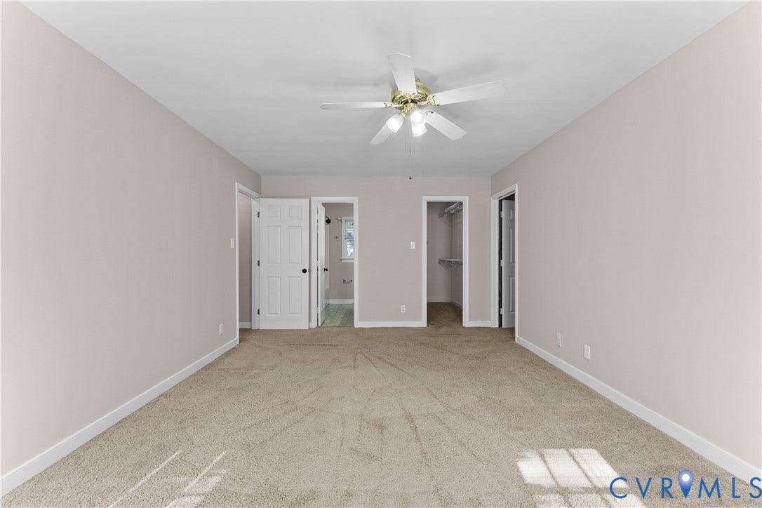 2307 Garrison Place Terrace, Garrison Place, Midlothian, VA 23112 Room featuring neutral-toned carpeting, white six-panel interior doors, and a ceiling-mounted light fixture with a central fan