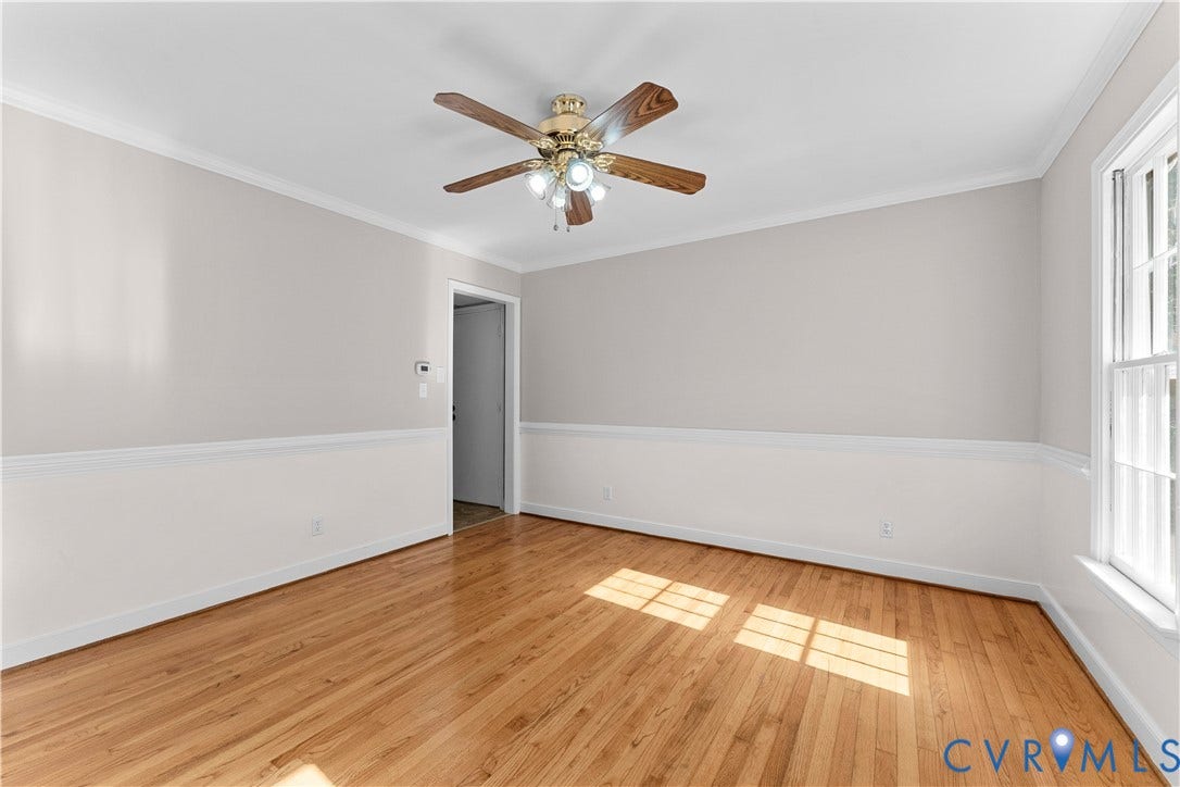 2307 Garrison Place Terrace, Garrison Place, Midlothian, VA 23112 Room interior featuring wood-finish flooring, chair rail molding, multi-light ceiling fan, and multi-pane windows