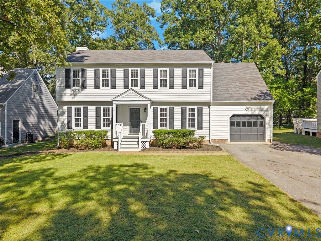 2307 Garrison Place Terrace, Garrison Place, Midlothian, VA 23112 Colonial-style exterior featuring white horizontal siding, dark decorative shutters, an asphalt shingle roof, an attached single-car garage, and a covered front entryway with steps