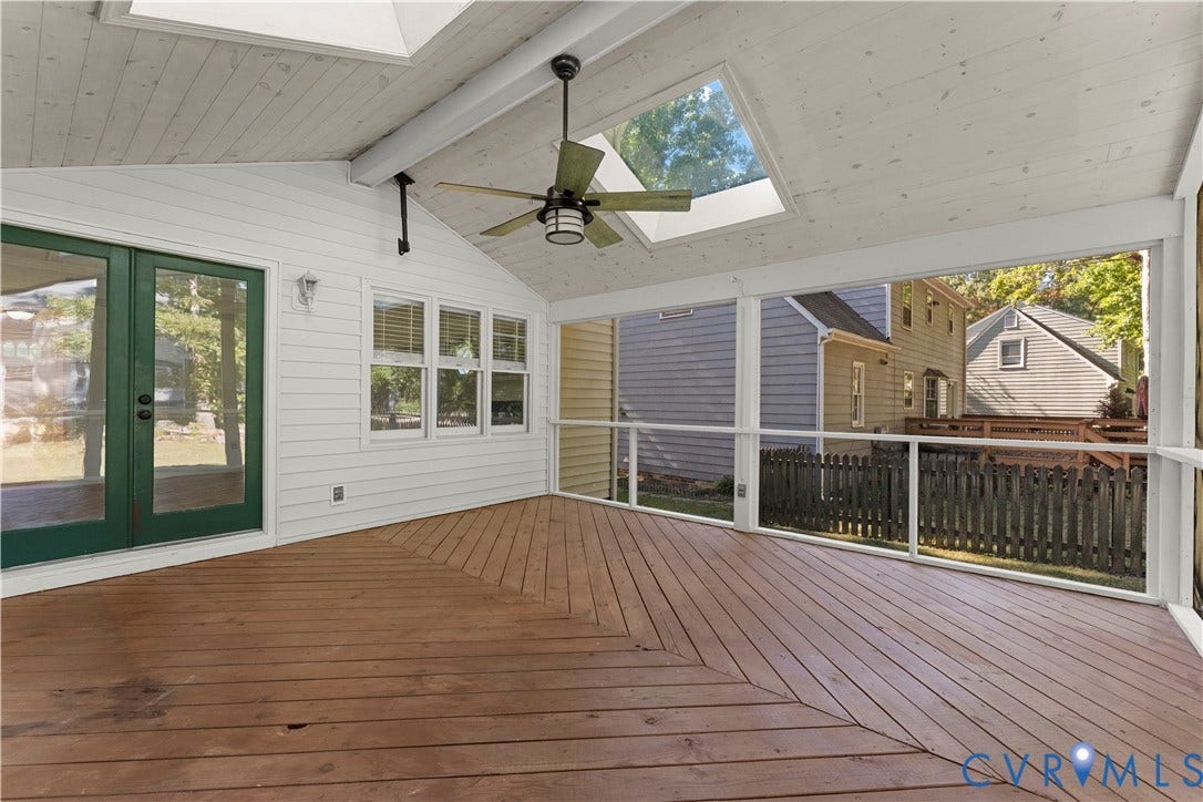 2307 Garrison Place Terrace, Garrison Place, Midlothian, VA 23112 Screened-in porch featuring wood-plank decking in a herringbone pattern, vaulted tongue-and-groove ceiling, dual skylights, and a ceiling fan