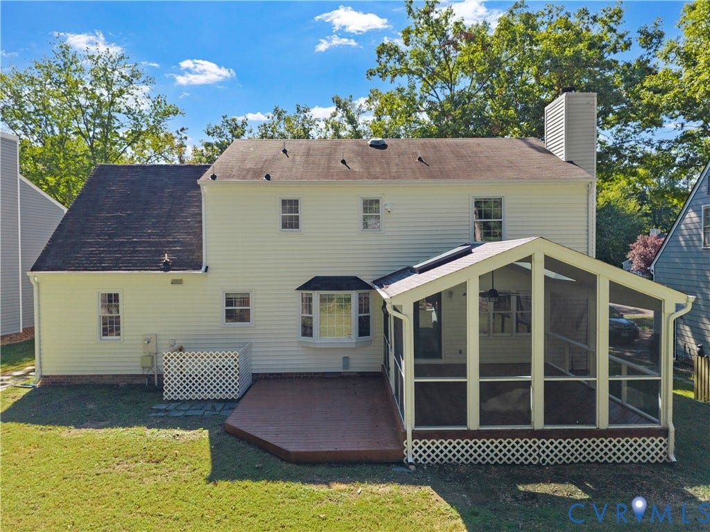 2307 Garrison Place Terrace, Garrison Place, Midlothian, VA 23112 Rear exterior featuring a multi-paneled screened-in porch, wood-tone deck, bay window, and exterior chimney