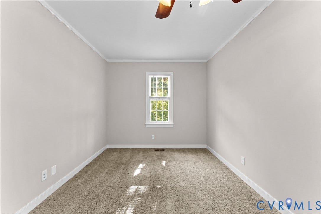 2307 Garrison Place Terrace, Garrison Place, Midlothian, VA 23112 Neutral-toned room featuring neutral carpeting, a single double-hung window, and a ceiling fan with light fixture