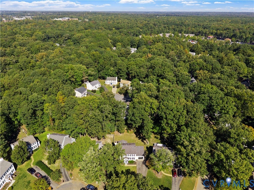 2307 Garrison Place Terrace, Garrison Place, Midlothian, VA 23112 Aerial perspective featuring a low-density residential setting surrounded by mature, densely wooded foliage