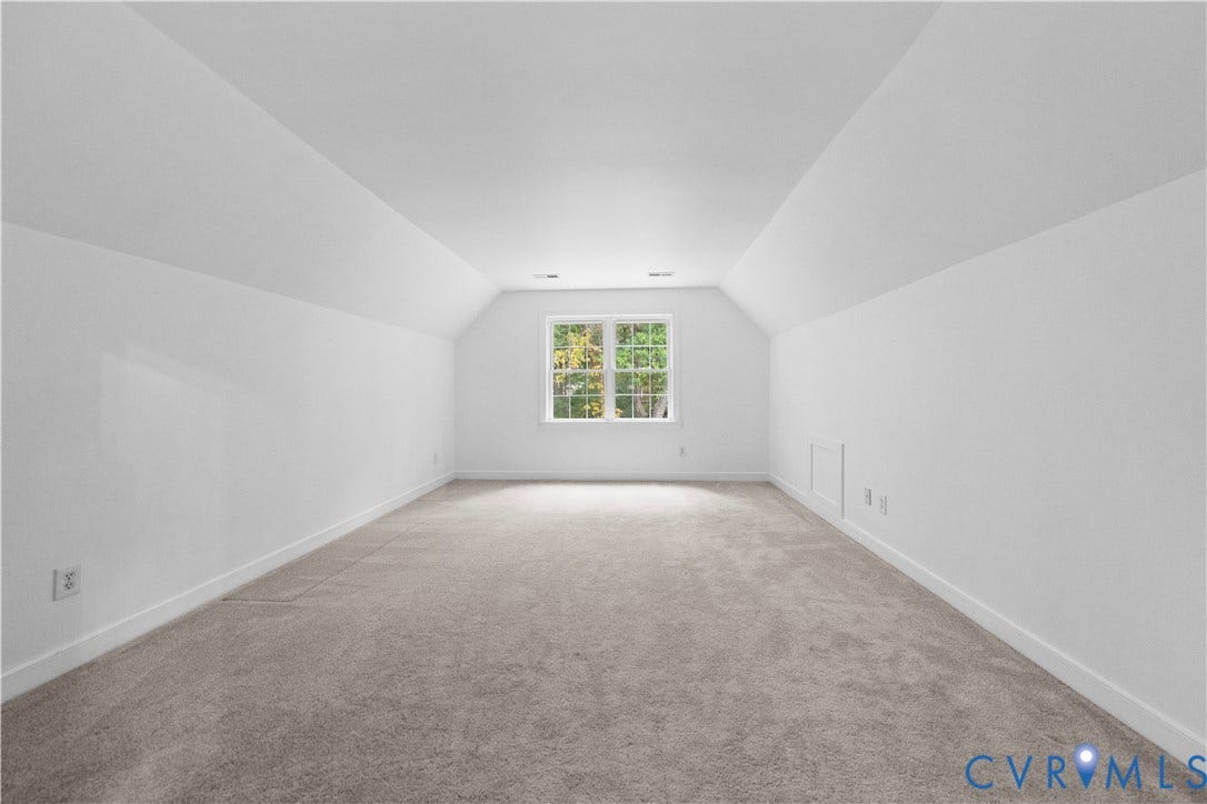 3437 Riverton Court, Robious Road Corridor, Midlothian, VA 23113 Room with neutral carpeting, vaulted ceiling lines, and a centered window with grid detailing