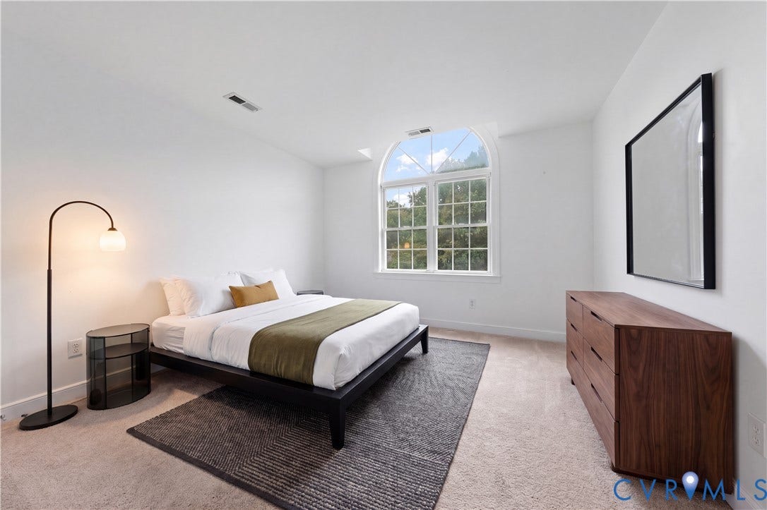 3437 Riverton Court, Robious Road Corridor, Midlothian, VA 23113 Neutral-toned interior featuring an arched window with grid mullions and wall-to-wall carpeting