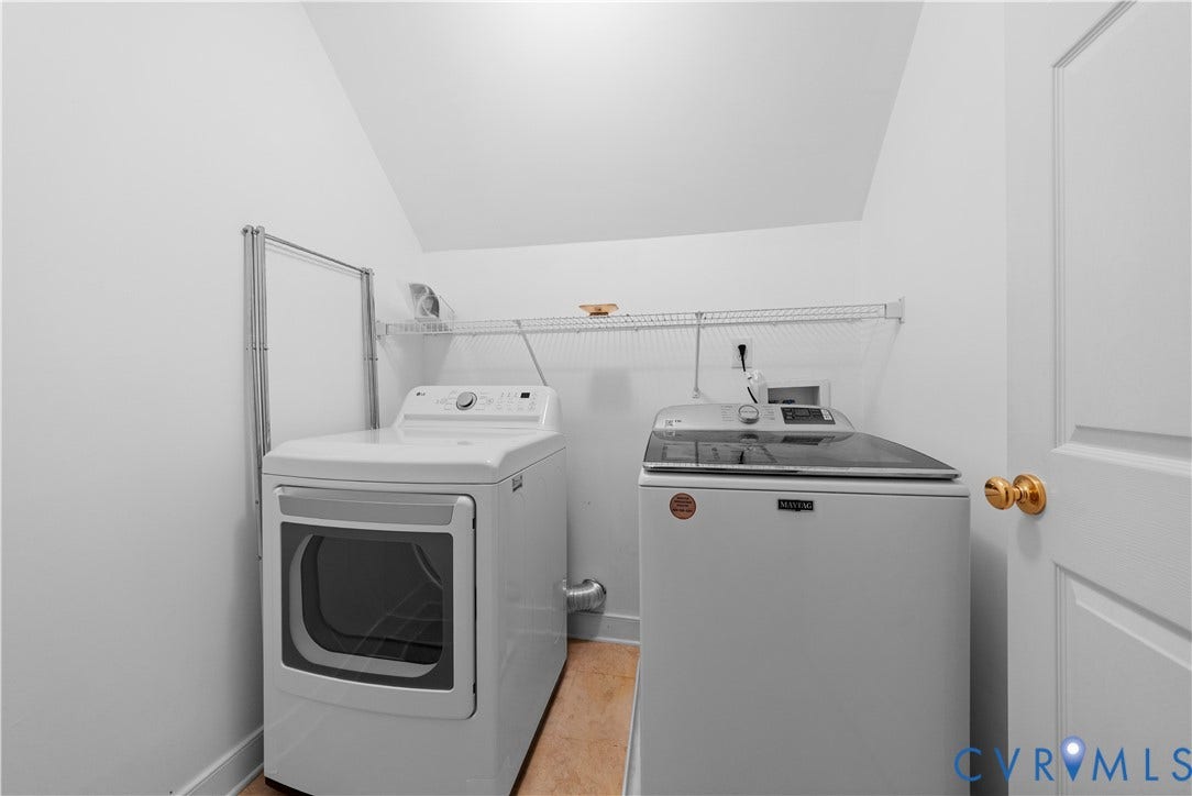 3437 Riverton Court, Robious Road Corridor, Midlothian, VA 23113 Laundry area featuring white walls, wood-finish flooring, a wall-mounted wire shelving unit, and a foldable metal hanging rack