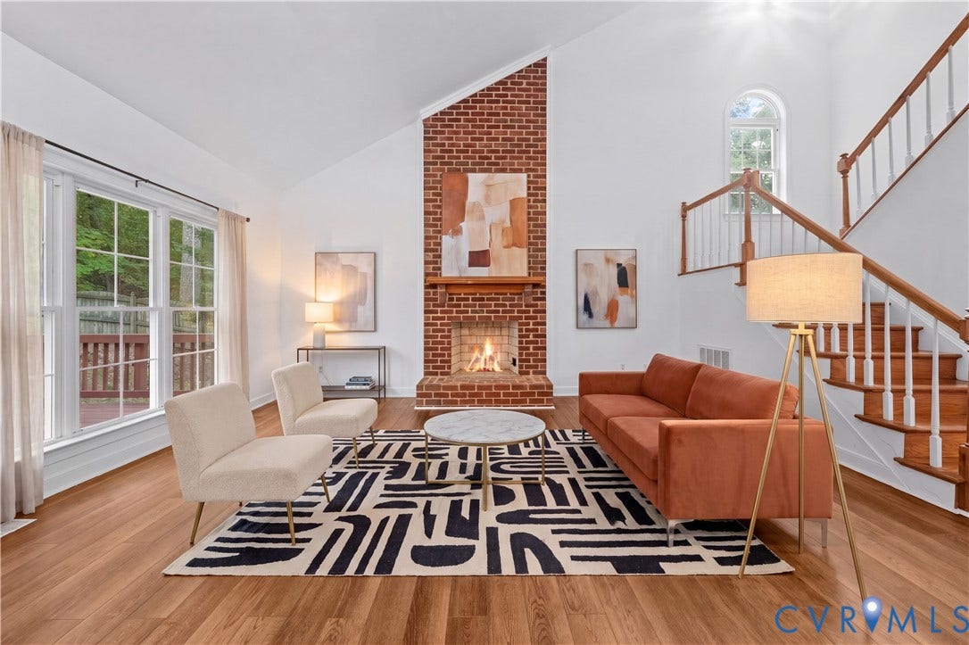 3437 Riverton Court, Robious Road Corridor, Midlothian, VA 23113 Vaulted ceilings, floor-to-ceiling brick fireplace with a wood mantel, wood-finish flooring, staircase with wood railings, and multi-pane windows