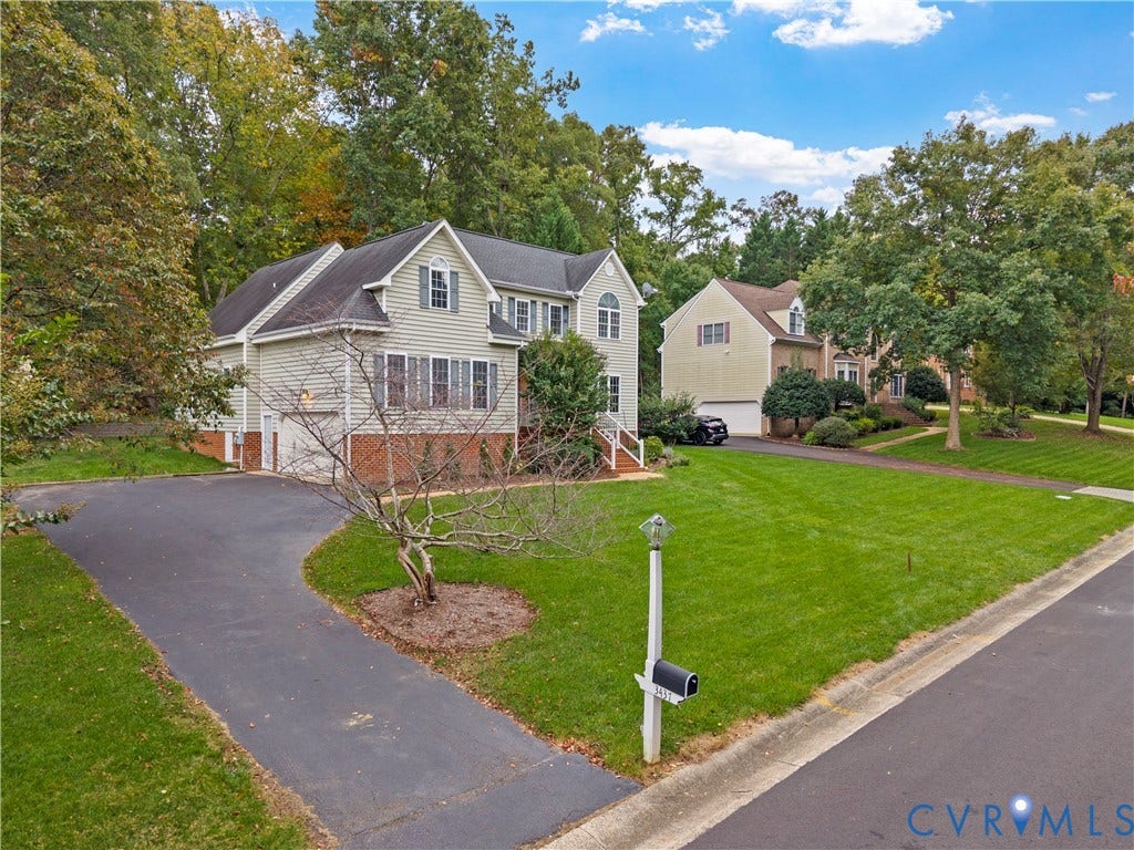 3437 Riverton Court, Robious Road Corridor, Midlothian, VA 23113 Two-story residence featuring a vinyl siding and brick exterior, multi-gabled roofline, asphalt driveway, and mature landscaping
