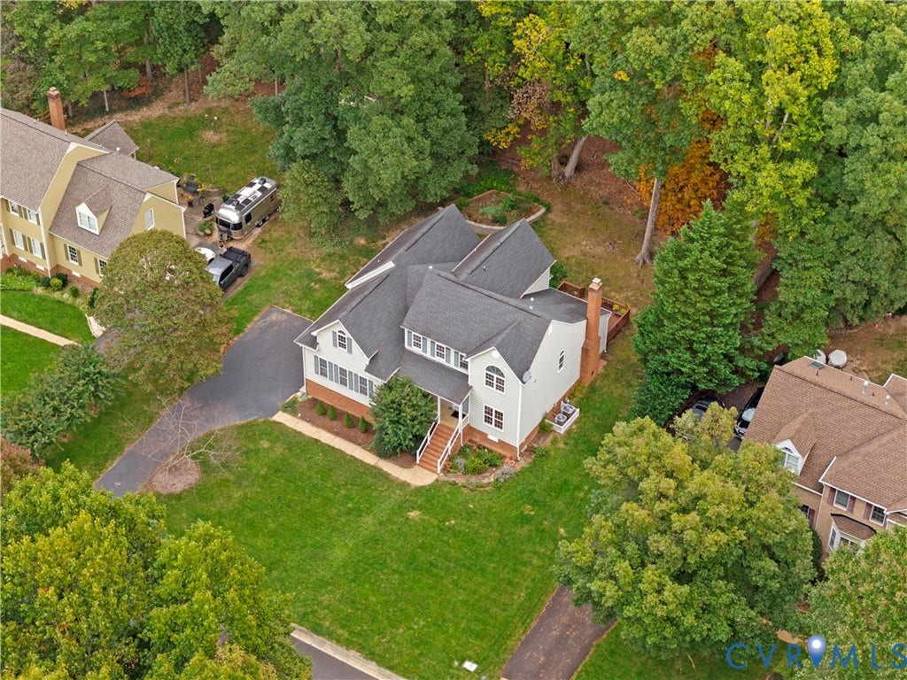 3437 Riverton Court, Robious Road Corridor, Midlothian, VA 23113 Two-story residence featuring a multi-gable asphalt shingle roof, brick and horizontal siding exterior, attached chimney, and concrete stairs with metal railings