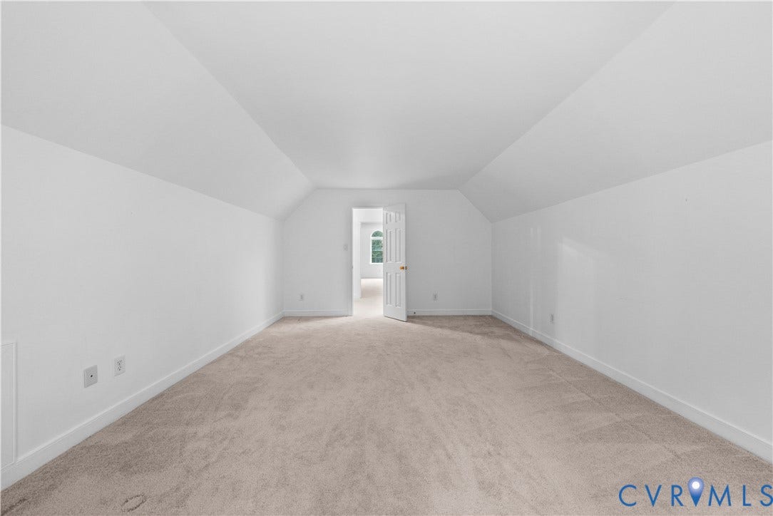 3437 Riverton Court, Robious Road Corridor, Midlothian, VA 23113 Expansive room featuring vaulted ceilings, neutral wall-to-wall carpeting, and a white six-panel interior door