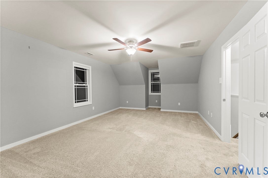 2953 Preston Park Court, Western Goochland County, Goochland, VA 23153 Spacious room featuring neutral carpet flooring, recessed windows, a ceiling fan with integrated lighting, and a white paneled door