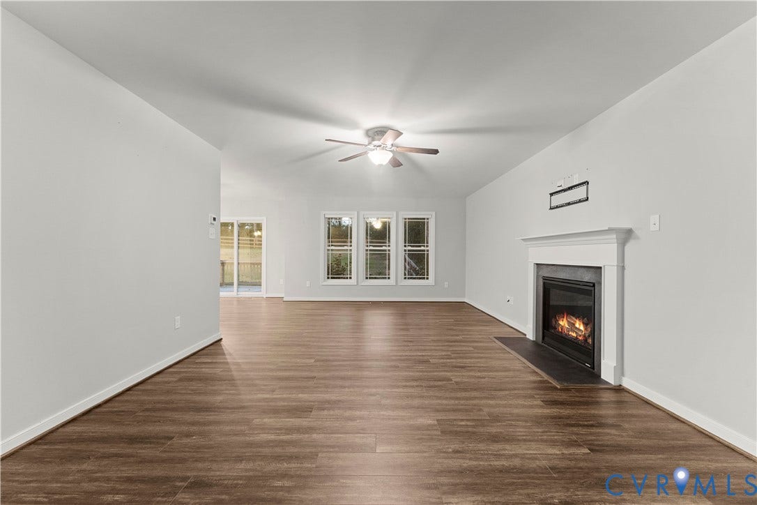 2953 Preston Park Court, Western Goochland County, Goochland, VA 23153 Spacious living area featuring wood-finish flooring, a vaulted ceiling, and a ceiling fan