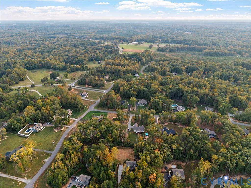 2953 Preston Park Court, Western Goochland County, Goochland, VA 23153 Expansive grassy area featuring a wooden fence perimeter and mature trees